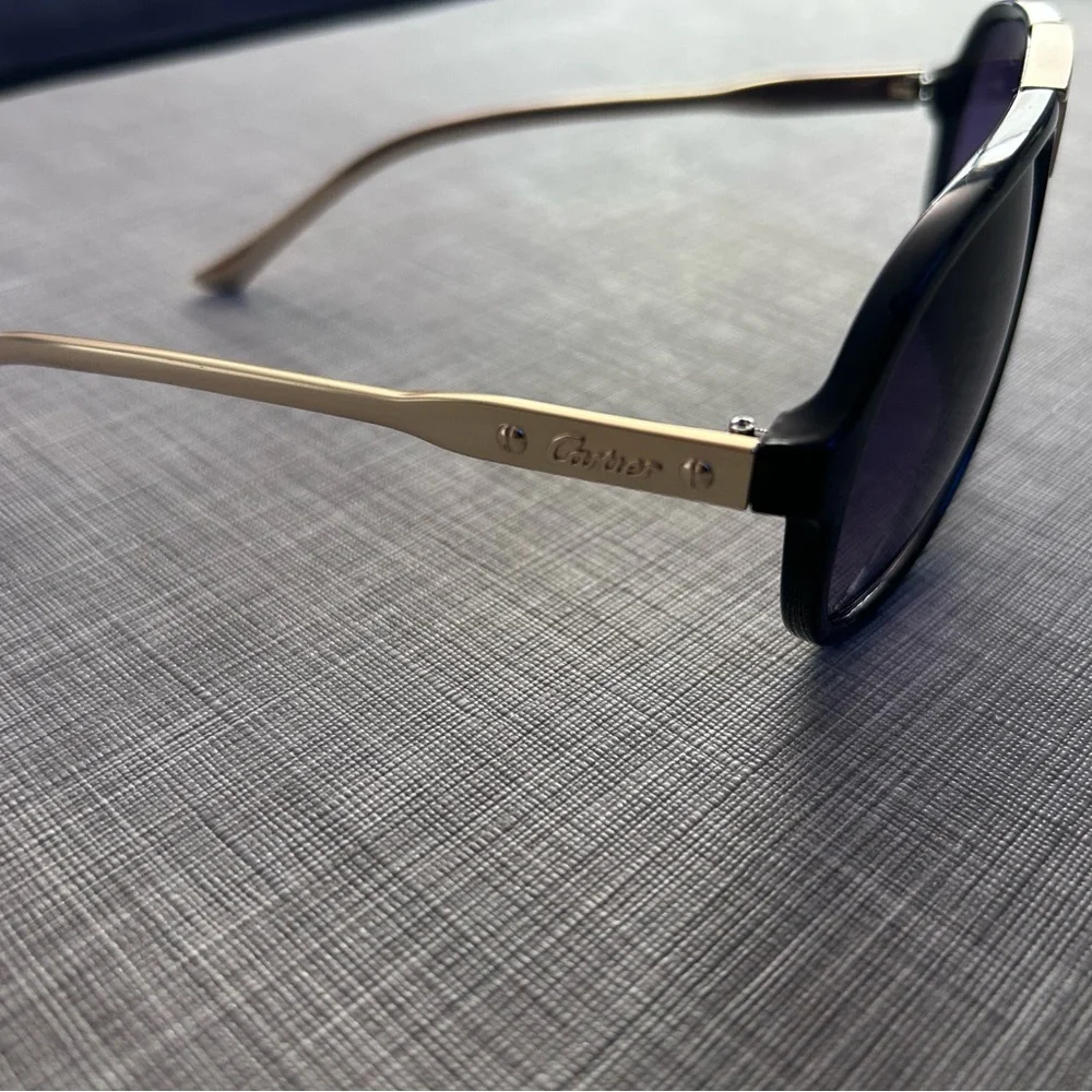 Cartier Black Frame Sunglasses with Purple Gradient Lenses and Gold Accent